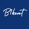 A square graphic with a dark blue background, featuring the word 'B1kent' in large white script inside a thin light purple rectangular border.